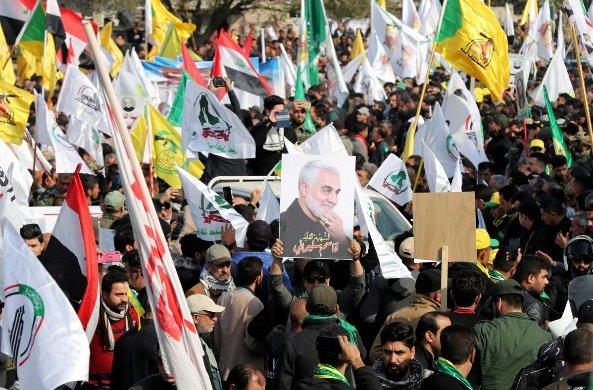 Thousands march in Baghdad to mourn Iranian general, others