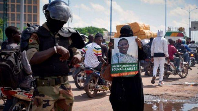 Soumaila Cissé - seen here in a protester's picture - was voted into parliament days after he was kidnapped (Photo: Getty Images)