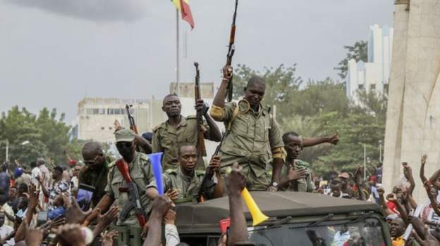 Malians cheered as Mali military entered the streets of the capital, Bamako