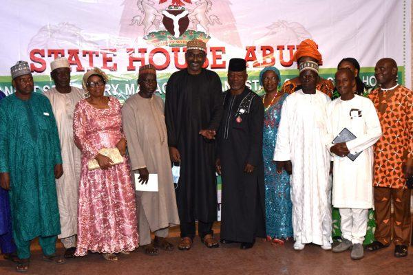 CAPTIONS Pic 1. Permanent Secretary, State House, Alhaji Tijjani Umar (M) with some retired staff during a Send-off ceremony in their honour of retirees at the State House Conference Centre in Abuja on Saturday night. 06367/15/11/2020/Callistus Ewelike/NAN PLEASE CREDIT NAN-PHOTO AND THE PHOTOGRAPHER