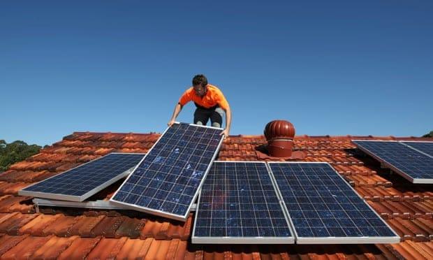 Solar panels are installed on to the roof of a house in Sydney, Australia. Almost 90% of new electricity generation in 2020 will be renewable, the IEA says. Photograph: Reuters