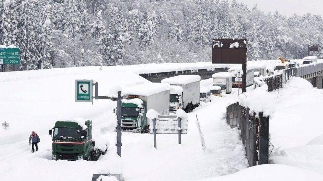 Snow traps 1,000 drivers in frozen traffic jam in Japan