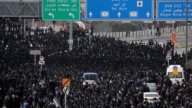 Thousands attend Israel funeral for orthodox rabbi in breach of Covid regulations