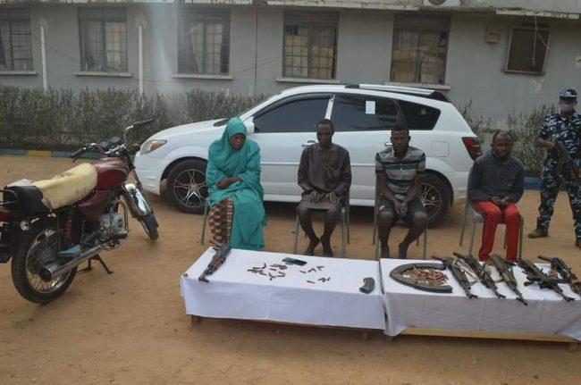 Police parade female leader of kidnappers, gang members in Kano