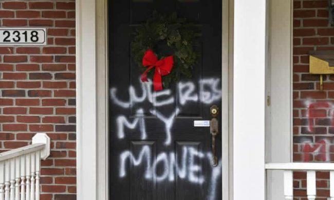Graffiti on a door of the home of Senate majority leader Mitch McConnell in Louisville, Kentucky. Photograph: Timothy D Easley/AP