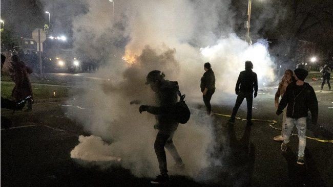 Unrest as police shoot black man in US