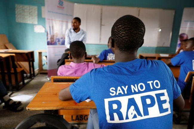 Students are seen in a classroom as they receive lectures about prevention of sexual violence, by a representative of Women at Risk International Foundation (WARIF) at Oregun High School, in Lagos