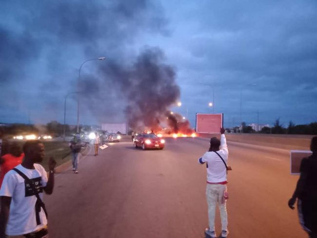 Protesters block airport road, set bonfires in Abuja