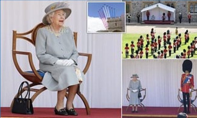 Queen smiles as she watches 'mini' Trooping the Colour parade to celebrate her official birthday at Windsor Castle