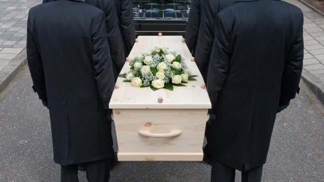 Woman arrested over jewellery thefts from coffins