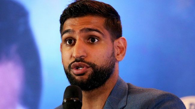 British boxer Amir Khan removed from US flight over face mask