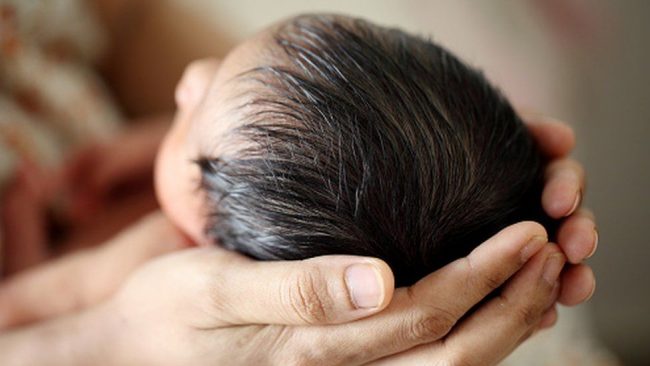 India baby girl found in drain recovering in hospital