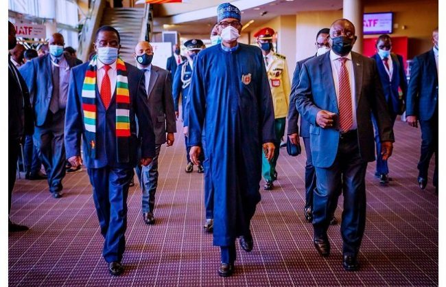 Buhari returns to Abuja after visits to France, South Africa