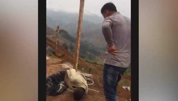 Rwanda jails Chinese national filmed whipping men tied to tree