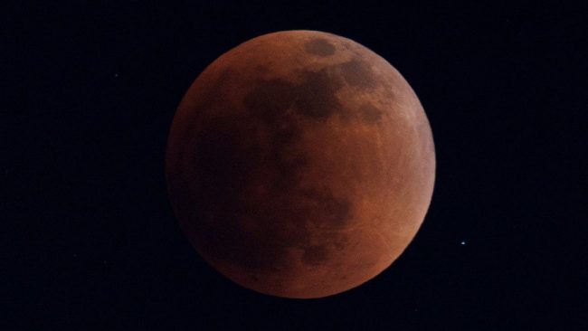 Full lunar eclipse creates rare super blood Moon