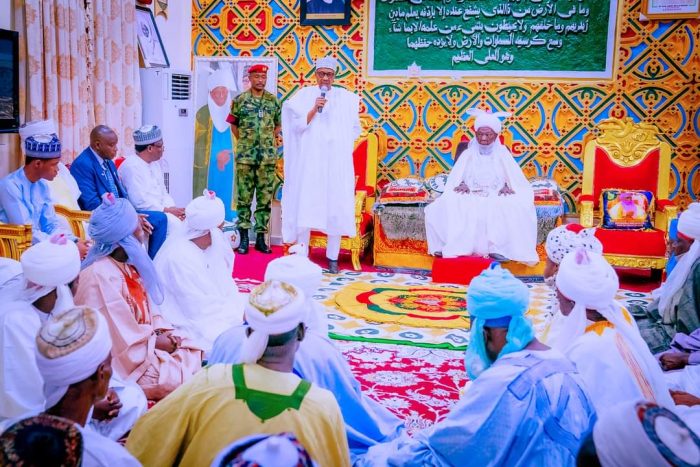 Buhari returns to Daura for guber polls, visits emir over daughter's death