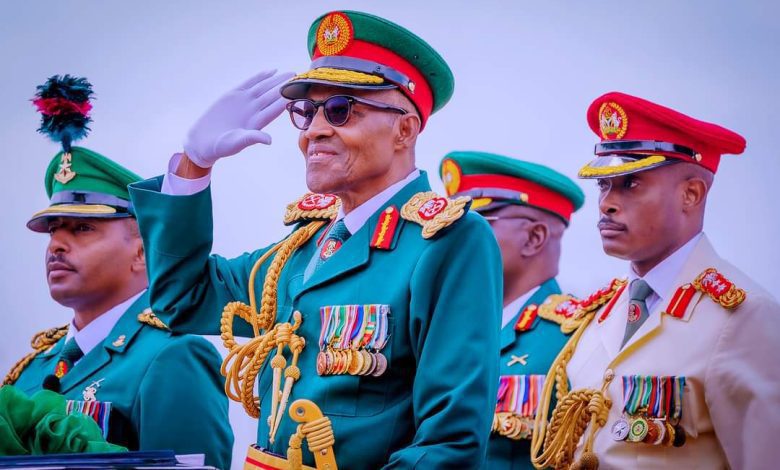 Photos: Buhari participates in Army trooping and color presentation parade