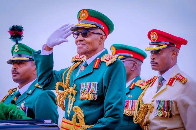 Photos: Buhari participates in Army trooping and color presentation parade