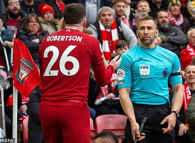 Assistant referee dropped amid investigation over apparent elbow on Andy Robertson
