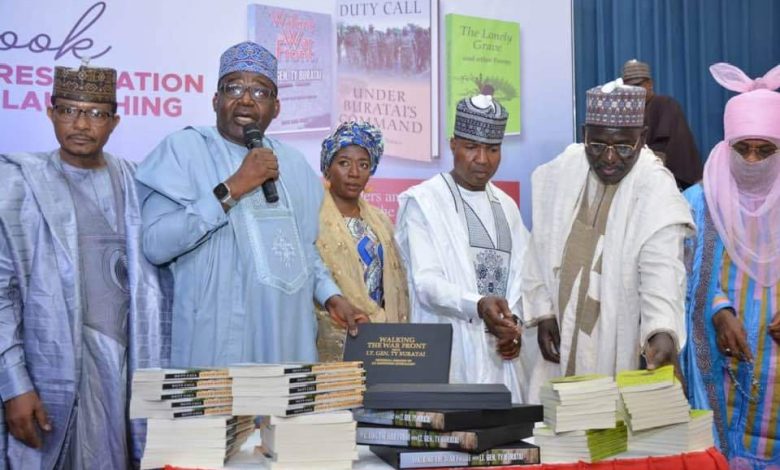 Book launch: Defence minister lauds journalist for authoring 3 books on military