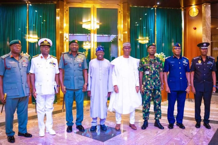 Work as a team to address insecurity, Tinubu tells security chiefs