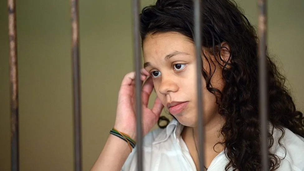 US woman gets 26 years in jail for role in mother's 'suitcase murder'