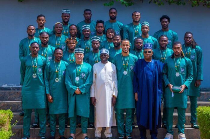 Tinubu fetes Super Eagles with national honours, plots of land, flats in FCT
